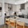 kitchen with an island, modern appliances and spacious counter-space