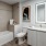 a bathroom with a tub toilet and sink