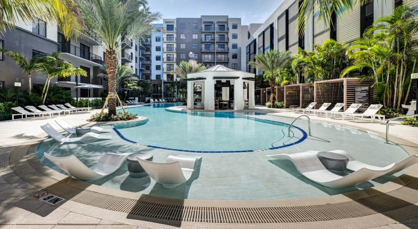 CERU resort style pool with shaded seating